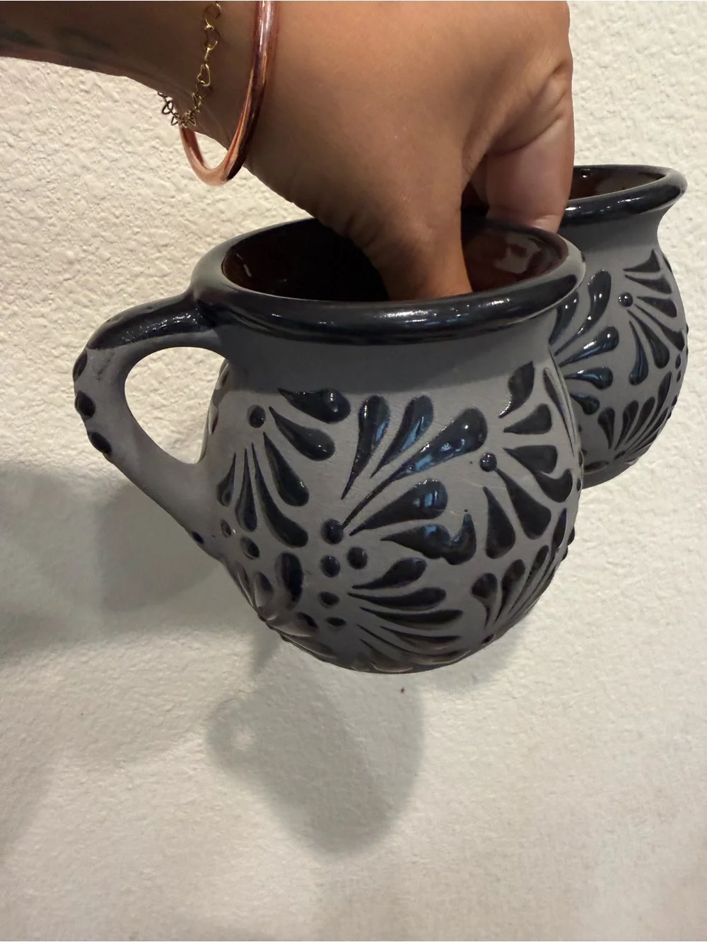 Mexican pottery coffee mugs hand painted black with flower detail